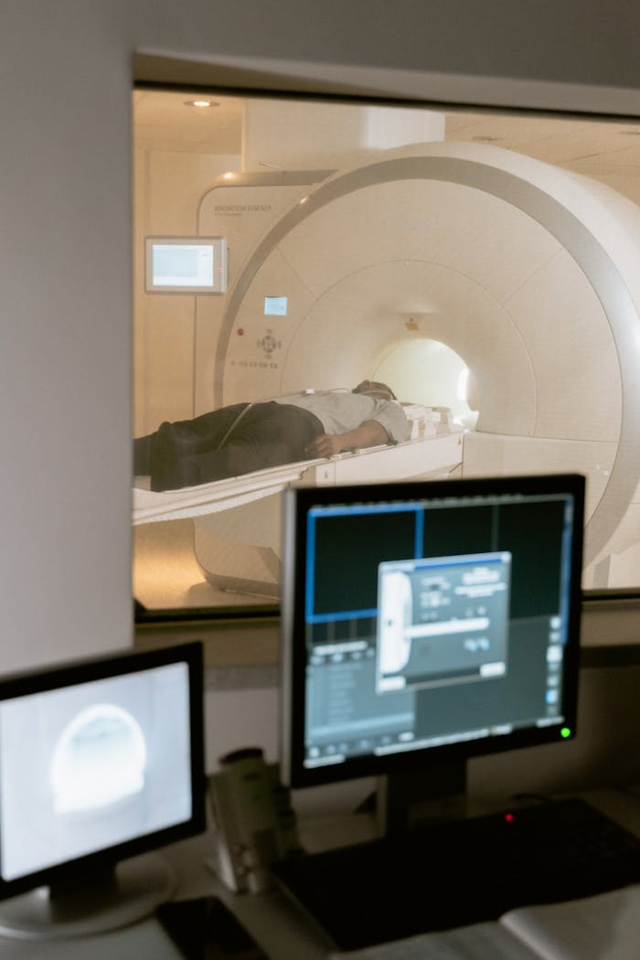 creative-03 Modern MRI scanner in a medical facility featuring patient and monitoring equipment.